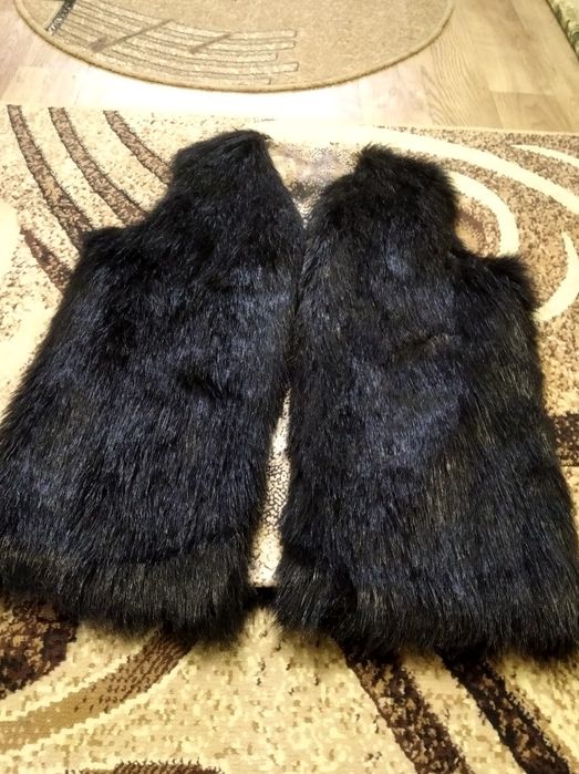 Меховая жилетка женская