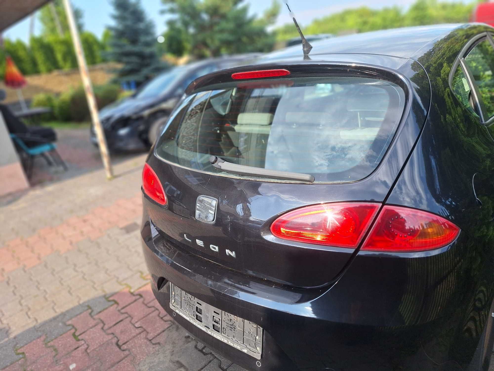 Seat Leon II lampy tylne w błotnik i klapę OE