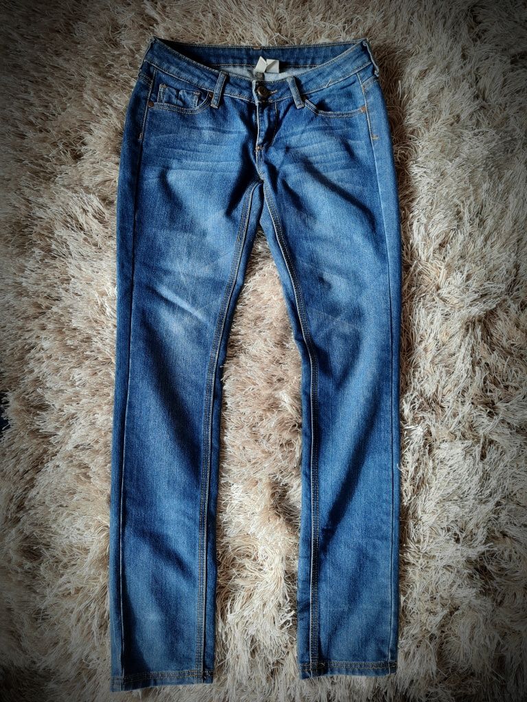 Jeansy damskie Mango