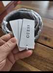 Cinto novo com etiqueta, original da Guess,pequeno defeitos nos furos