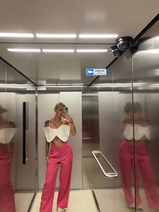 Rozowe eleganckie lub codziennie spodnie