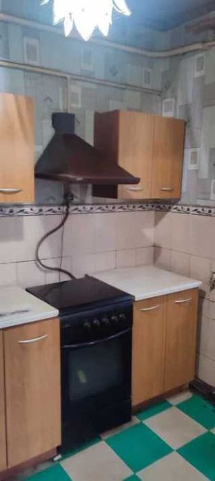 Продам кирпичный Дом на поселке  Строителей в городе Каменское.