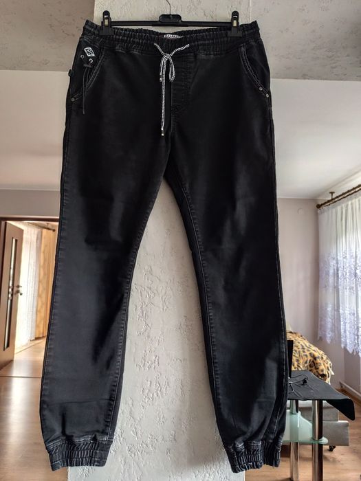Męskie jeansowe joggery w gumę w pasie ściągane sznurkiem rozm M. M.Sa