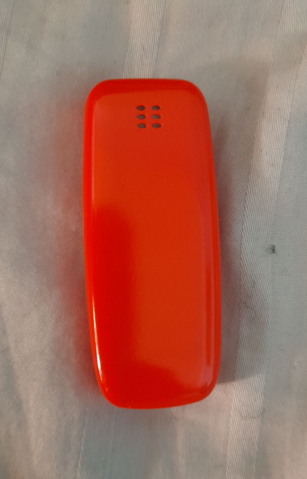 Tenho 2 destes mini telemoveis para venda