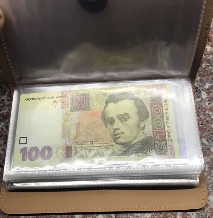 Альбом для банкнот на 50 аркушів.