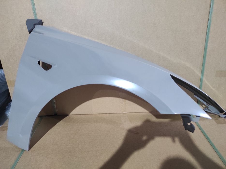 Tesla model 3 крило крыло