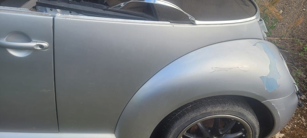 Błotnik prawy lewy tylny vw new Beetle cabrio