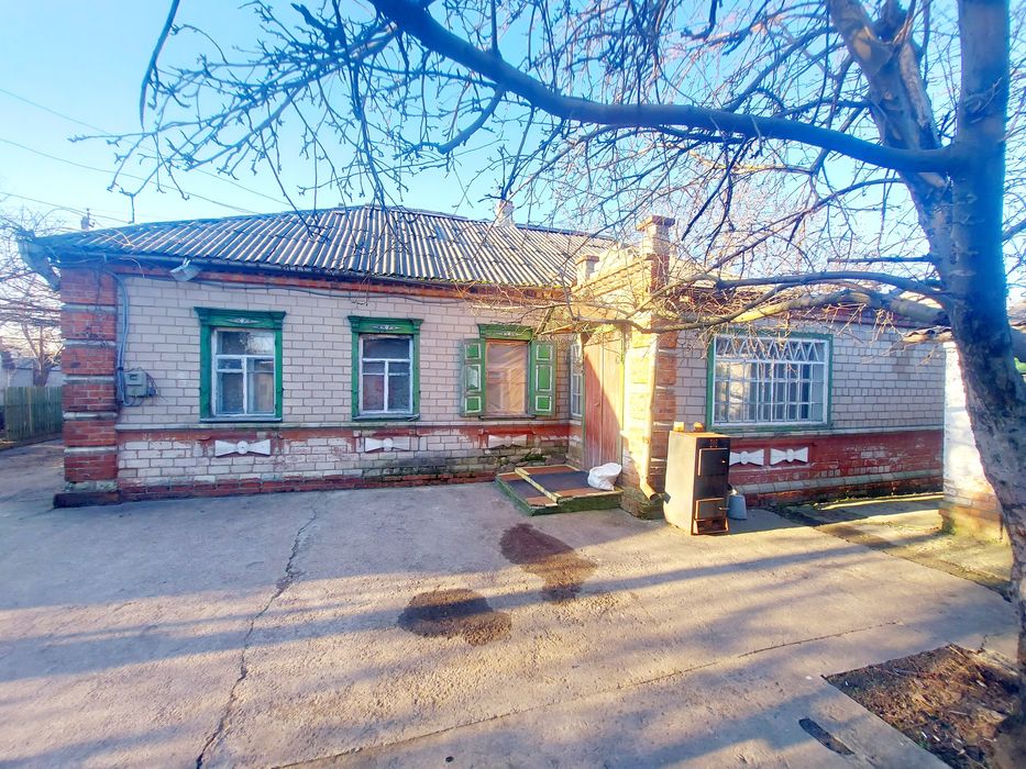 Продам дом с участком под коммерцию в Подгородном