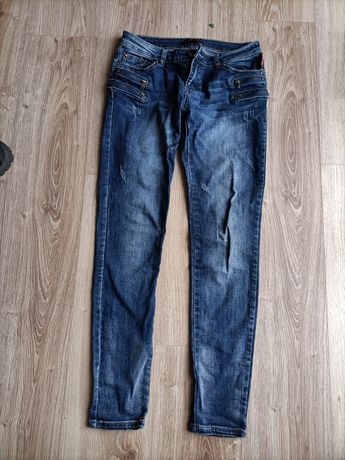 Spodnie damskie jeansy 38