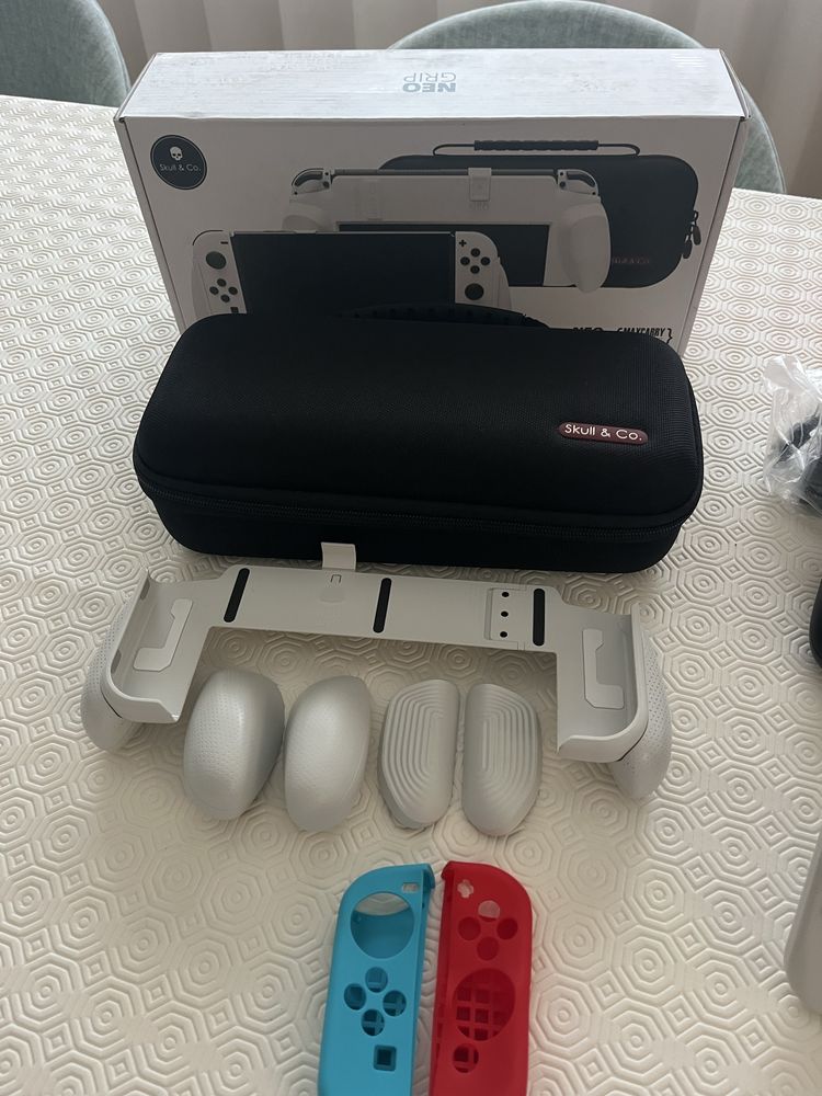 Nintendo switch oled + skull & go + acessorios