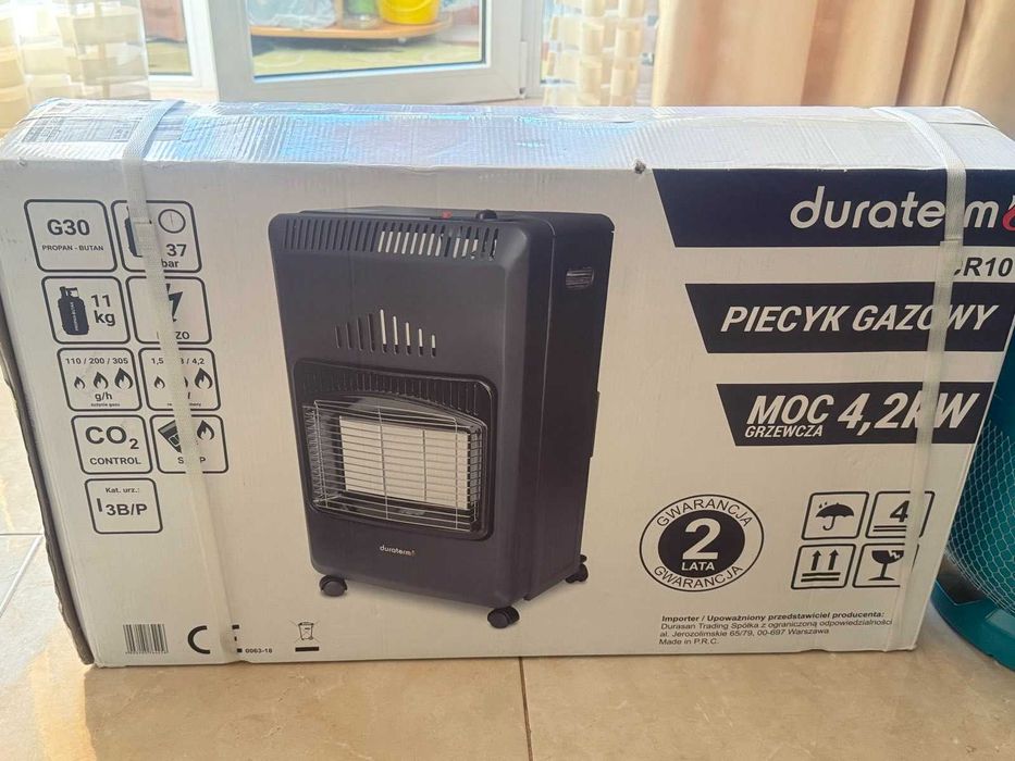 Газовий обігрівач з балоном,редуктором, і заповнений газом. Новий