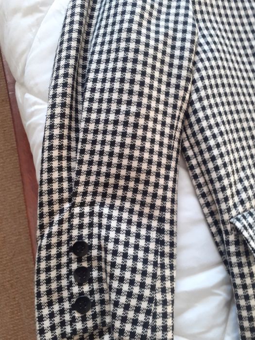 Casaco em pied de poul preto e branco