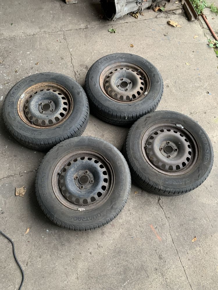Felgi Stalowe z Oponami wielosezon 4x100 185/70/15 Et 39 Opel corsa