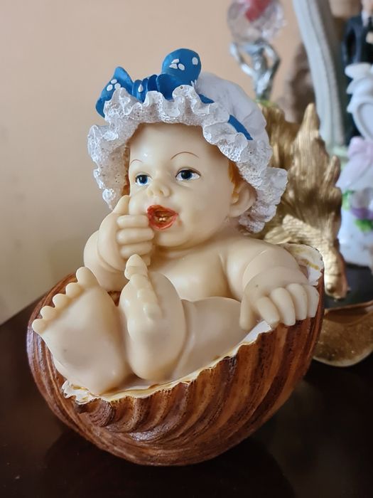 Skarbonka dziecko w muszli