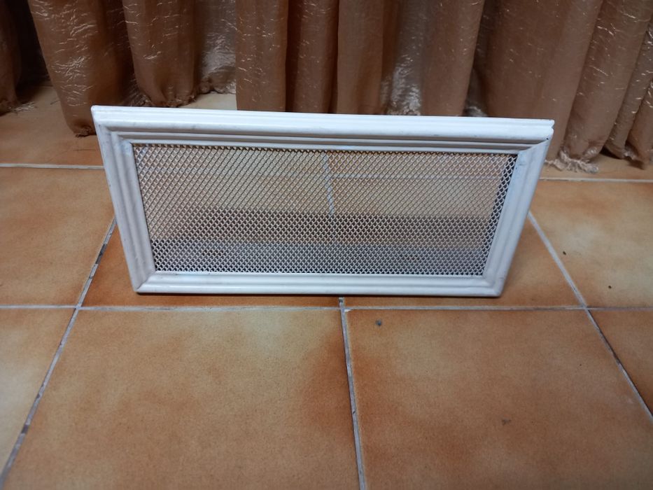 Recuperador de calor com ventilador e moldura.