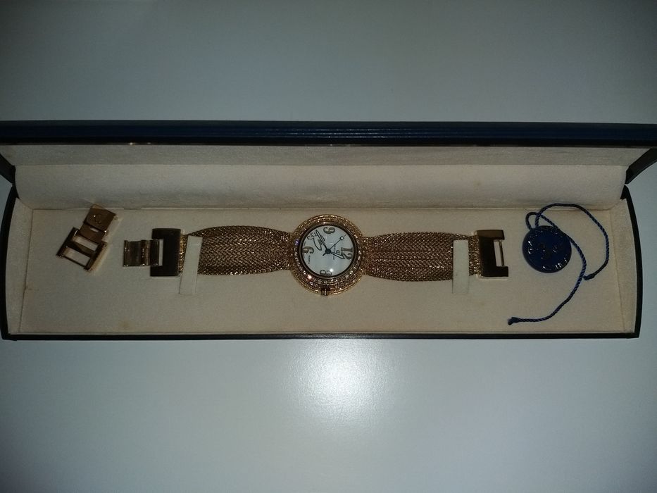 Relogio dourado cristian lay