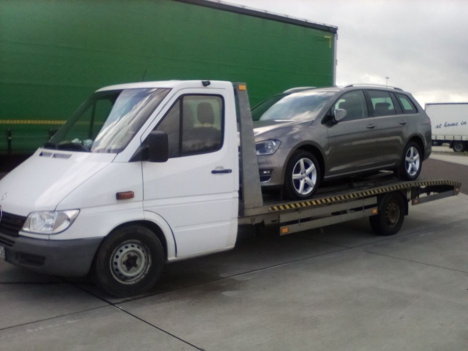 Auto laweta Transport Niemcy Auto Pomoc Tanio Dzwoń 24H.