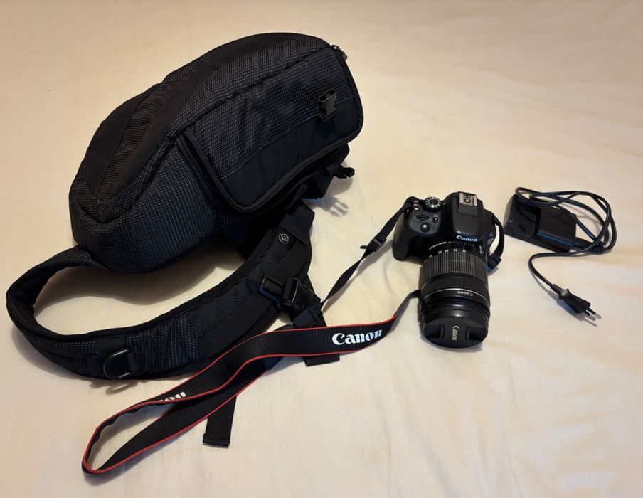 Máquina fotográfica Canon EOS 100D c/ objetiva 18-135mm e acessórios