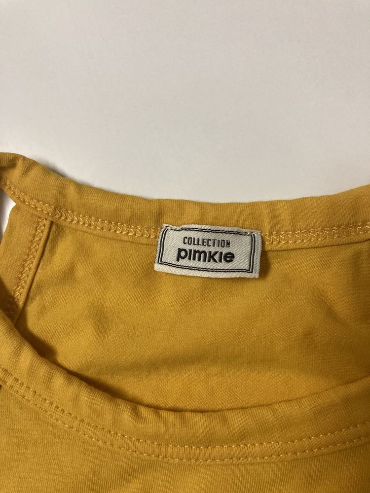 Top amarelo da Pimkie