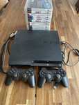 Ps3 slim 120gb + 2 comandos + Jogos