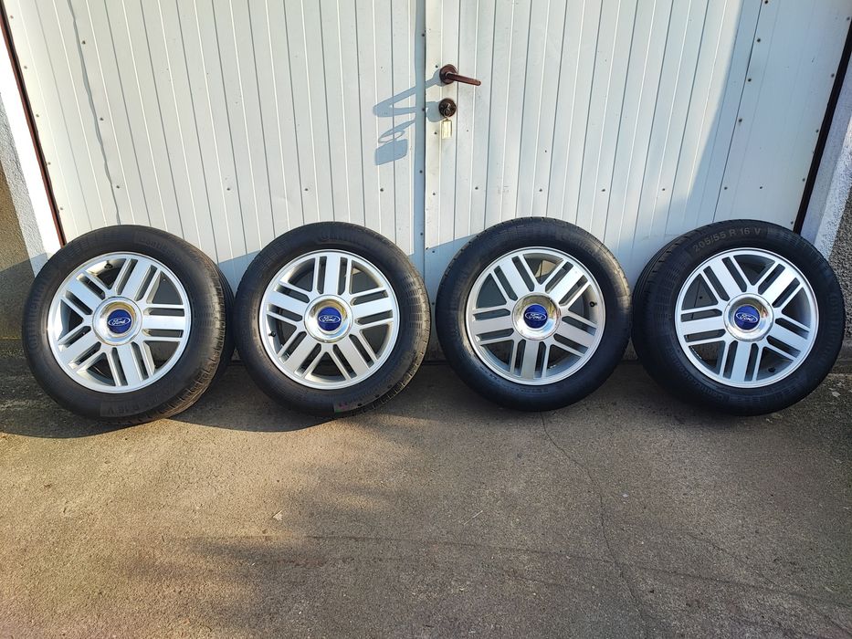 4x Koła alufelgi Ford Focus mk2 OE 205/55/16 opony lato Continental