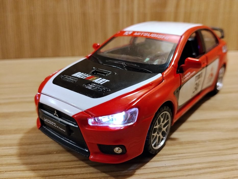 Модель mitsubishi lancer x evolution 1:32 Автопром металл свет звук ин