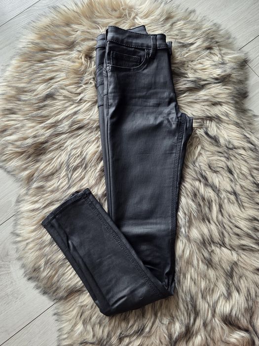 Woskowane spodnie Mango rozm. 32 push-up