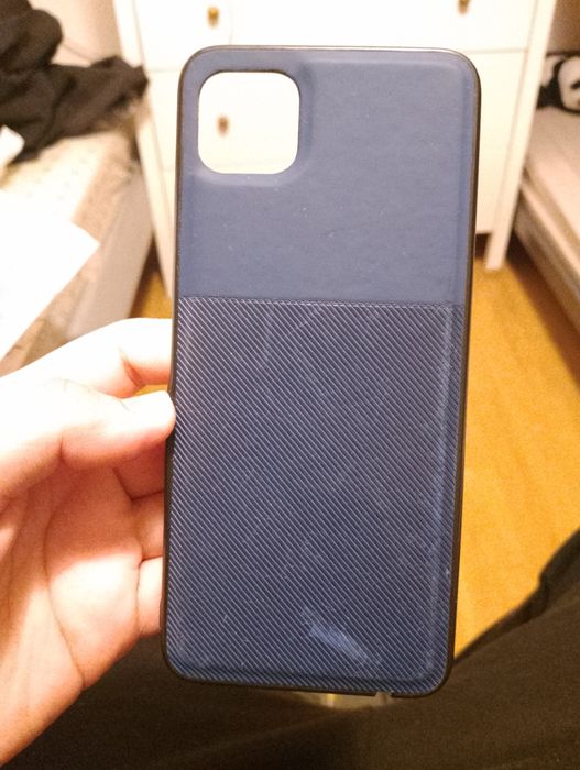 Coisas diversas : borracha de fone , capa de celular usada