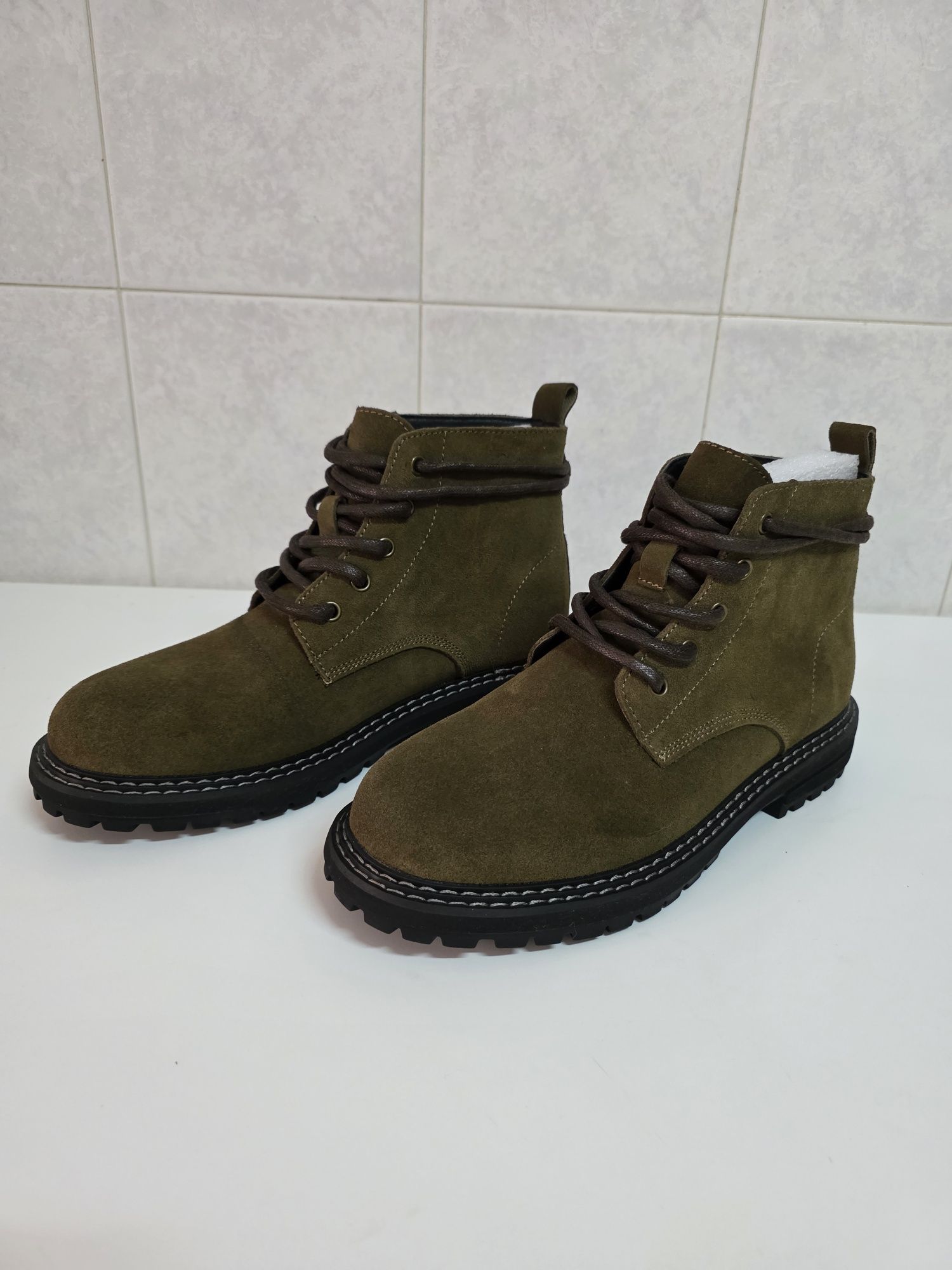 Botas de cano curto em couro