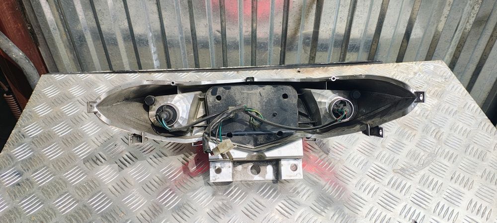 Sym GTS 125,250,300 Lampa tył.