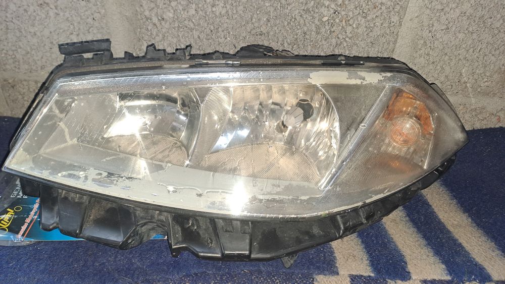 Меган 2 фара ліва дорест