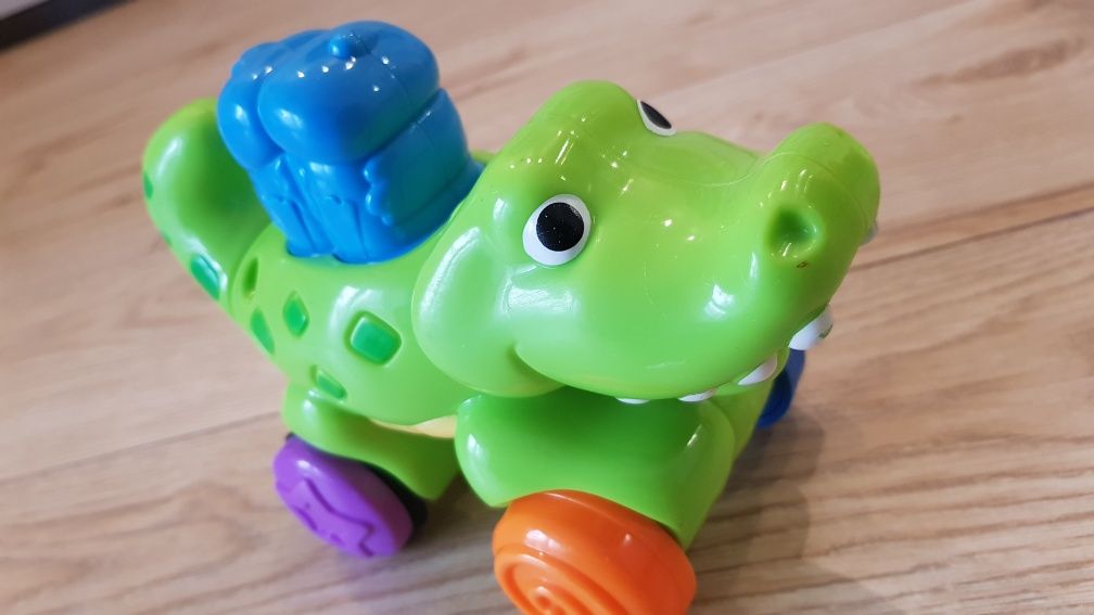 Aligator krokodyl Fisher Price, wieża auta Clementoni