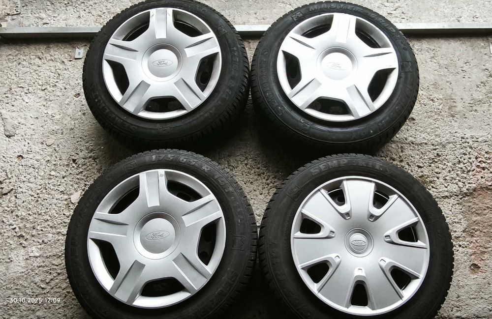 Felgi stalowe z kołpakami 14 cali