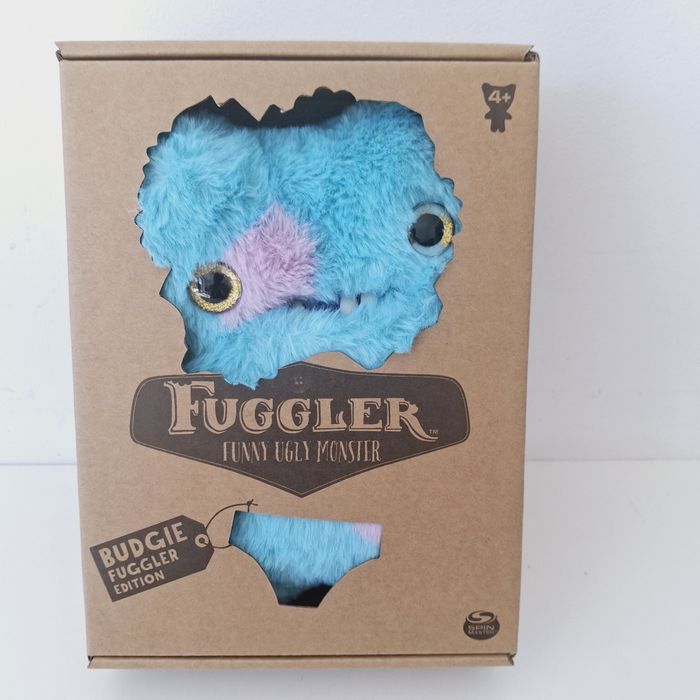Niebieski stworek Fuggler z zębami