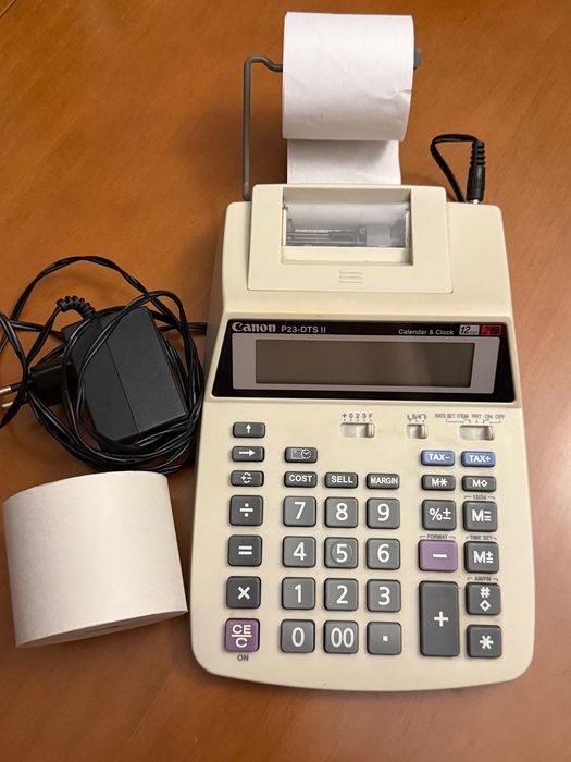 Maquina calculadora com rolo e rolo suplente