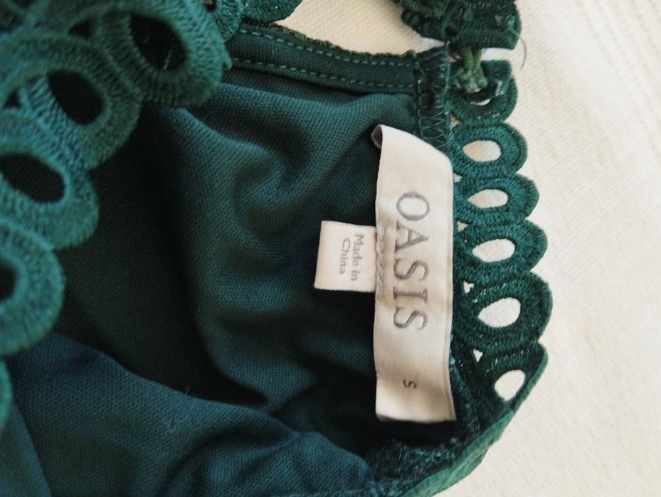 Koktajlowa, elegancka sukienka z długim rękawem, butelkowa zieleń, kor