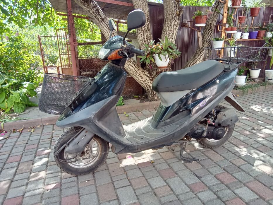 Скутер Honda tact