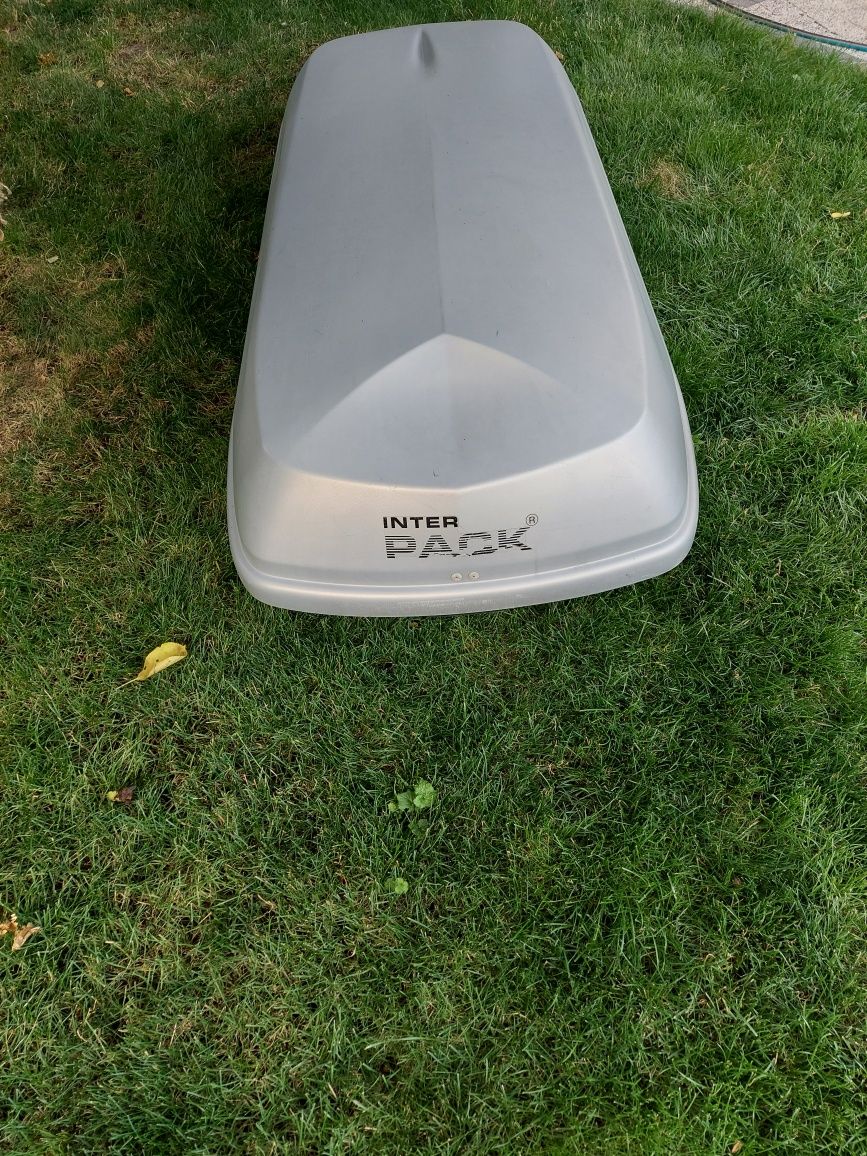 Box dachowy INTERPACK z utomatycznymi zaciskami
