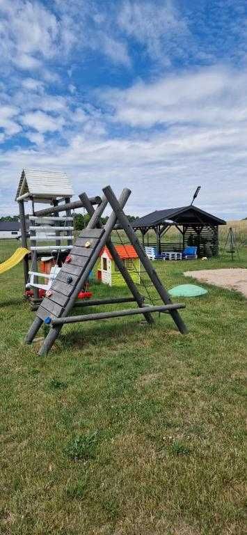 Domek Mikołajki z własną plażą, pomost, łódka Szary domek Mikołajki