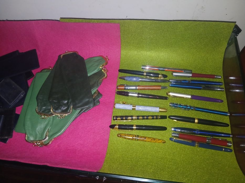 Lote de 32 caneta e 32 bolsa pele