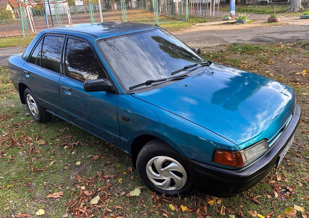 Mazda 323 расход 7л/100км