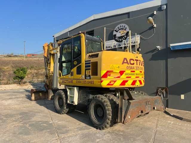 komatsu PW148-10