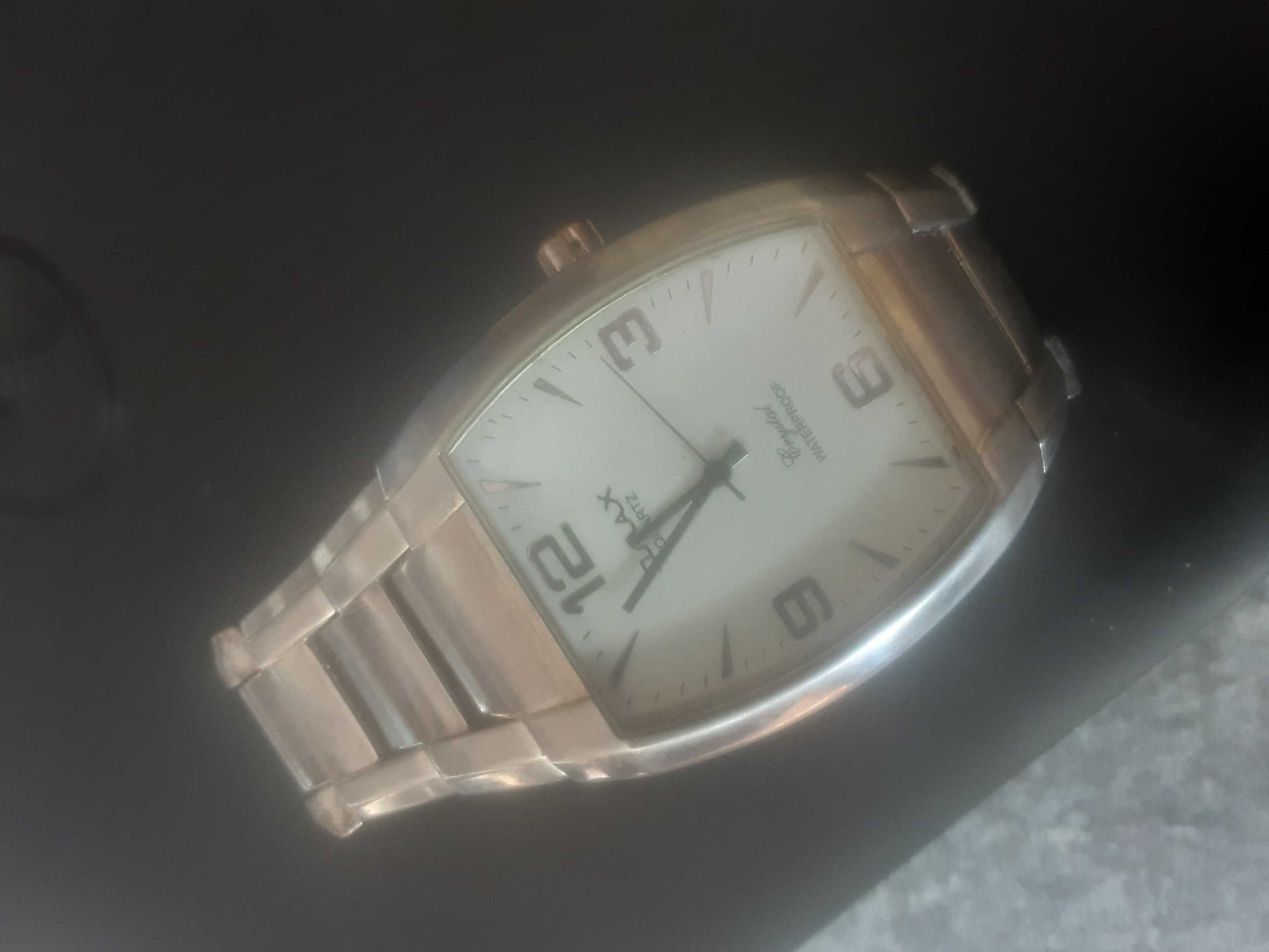 OMAX (firma założona w 1946 r. w Genewie) - masywny, męski zegarek