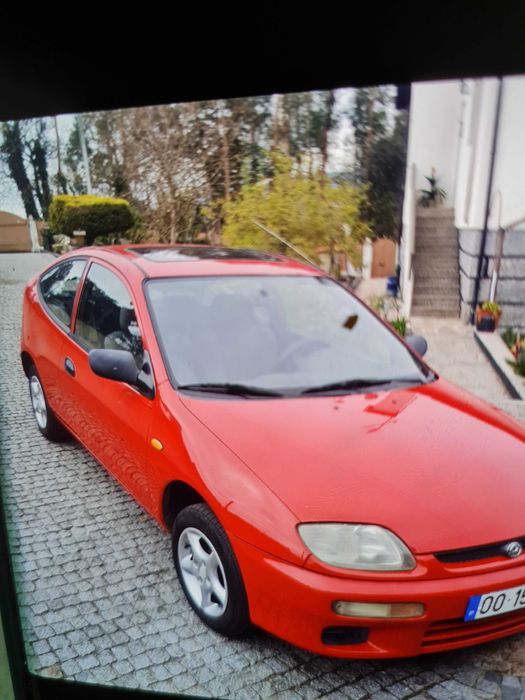 Mazda 323 coupé impecável