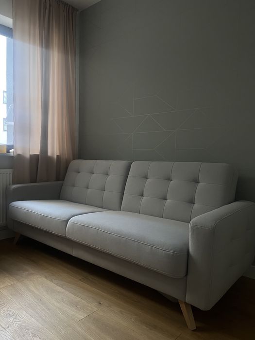 Sofa z funkcją spania i pojemnikiem na pościel