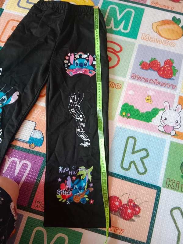 Nowe spodnie dziewczęce dresowe Stich 7-8Y