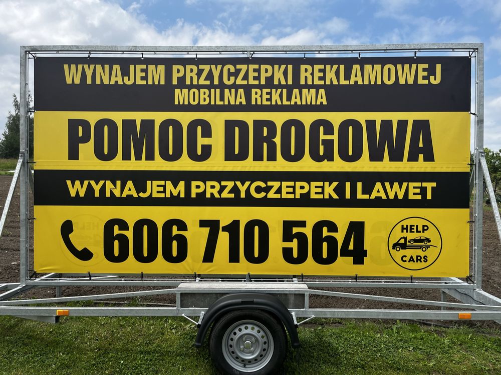 Przyczepka reklamowa wynajem reklama stacjonarna mobilna