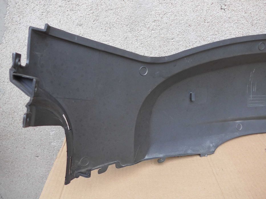 Sym Fiddle II '08-14r OWIEWKA prawy tył emblemat