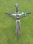 czarny rower woom 4