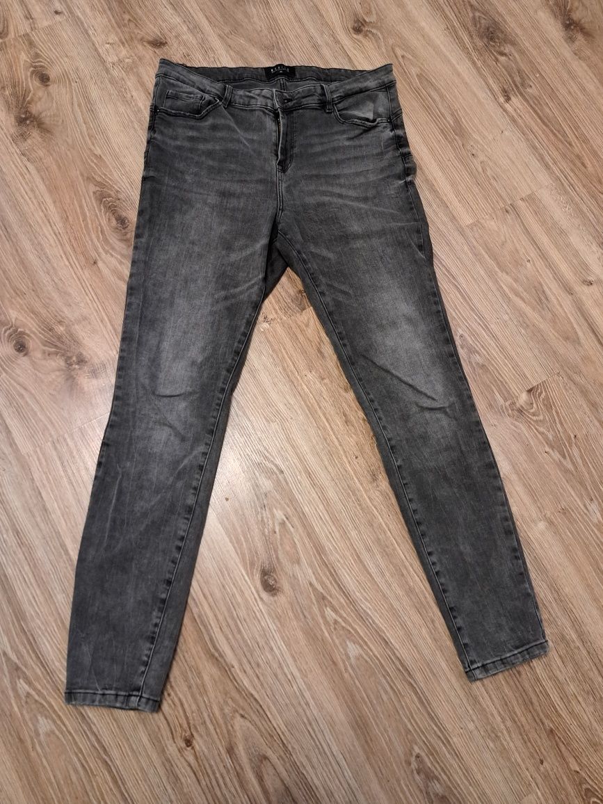 Spodnie jeans przecierane rozmiar 42 Mohito